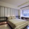 现代风格米色休闲卧室效果图