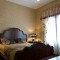 温馨米色美式卧室装饰设计图片